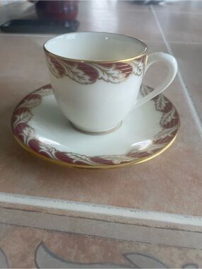 Elegant White Porcelain Teacup & Saucer with Gold and Burgundy Leaf Border